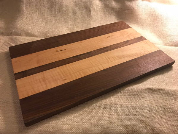 Walnut and maple striped cutting board