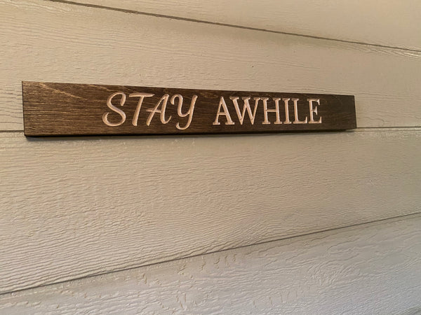 Stay Awhile sign
